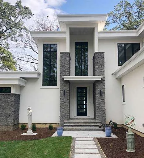 Stone wall cladding front view of house exterior design
