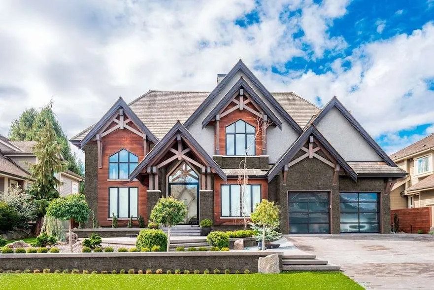 Evolve Stone Cladding - two-storey house and driveway